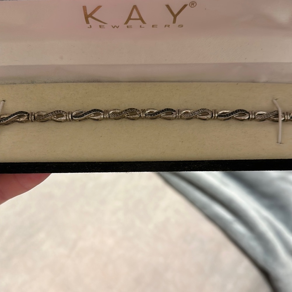 Kay Jewelers black and white diamond infinity bracelet.